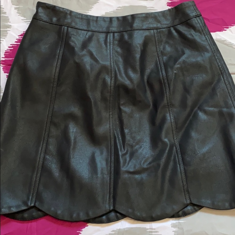 Black leather mini skirt